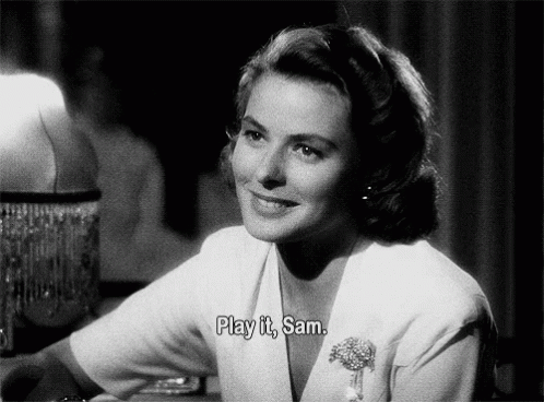 a black and white photo of a woman with the words play it sam above her