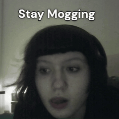 A Black And White Photo Of A Woman With The Words Stay Mogging Below Her GIF