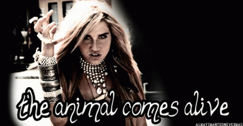 A Black And White Photo Of A Woman With The Words The Animal Comes Alive Above Her GIF