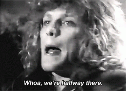 A Black And White Photo Of A Woman With The Words `` Whoa , We 'Re Halfway There '' . GIF