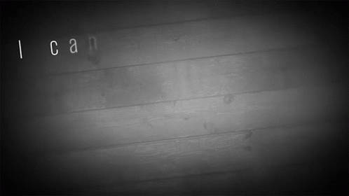 a black and white photo of a wooden surface with the words i can written on it