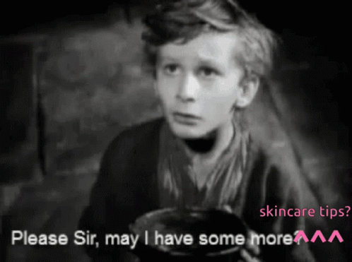 A Black And White Photo Of A Young Boy Asking For Skincare Tips GIF