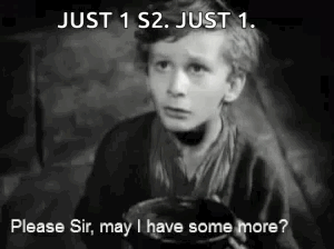 A Black And White Photo Of A Young Boy Holding A Bowl And Asking For Something . GIF