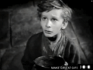 A Black And White Photo Of A Young Boy Holding A Cup With The Caption Make Gifs At GIF