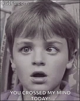 A Black And White Photo Of A Young Boy With A Surprised Look On His Face And The Words `` You Crossed My Mind Today '' . GIF