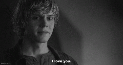 A Black And White Photo Of A Young Man Saying " I Love You " GIF