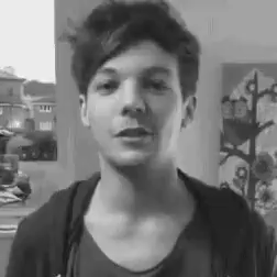 Black And White Photo Of Young Man In Hoodie GIF