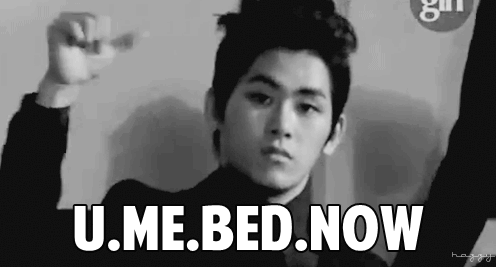 A Black And White Photo Of A Young Man With The Words " U.me.bed.now " Above Him GIF