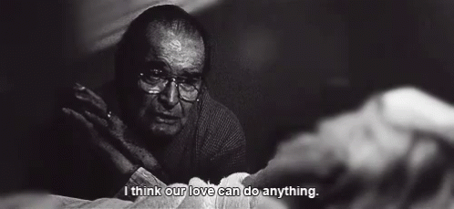 A Black And White Photo Of An Elderly Man With Glasses And The Words I Think Our Love Can Do Anything GIF