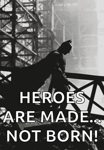 A Black And White Photo Of Batman With The Caption Heroes Are Made ... Not Born GIF