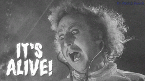 A Black And White Photo Of Frankenstein With The Words It 'S Alive On The Bottom GIF
