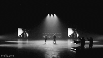A Black And White Photo Of People On A Stage With Imgflip.com Written On The Bottom GIF