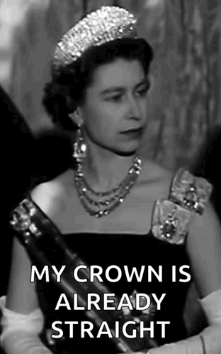 A Black And White Photo Of Queen Elizabeth Ii Wearing A Tiara And A Necklace . GIF