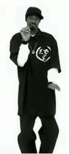 A Black And White Photo Of Snoop Dogg Dancing . GIF