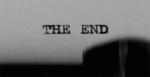 A Black And White Photo Of The End Written On A Piece Of Paper GIF