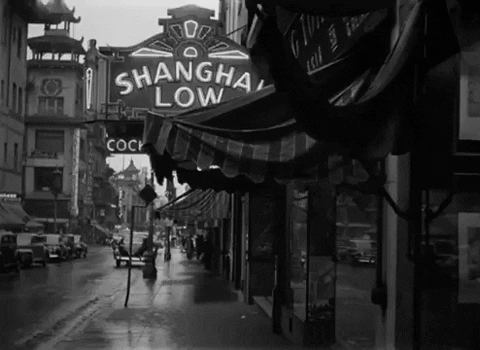 A Black And White Photo Of The Shanghai Low Store GIF