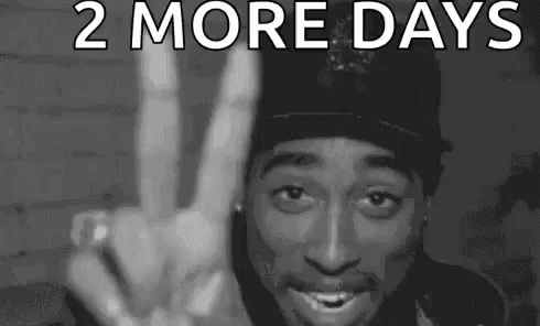 A Black And White Photo Of Tupac Shakur Making A Peace Sign . GIF