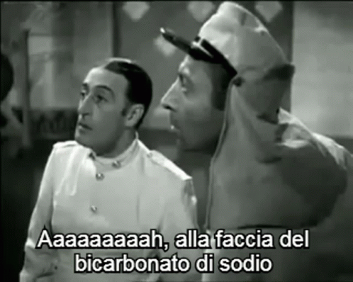 A Black And White Photo Of Two Men With A Caption That Says Aaa GIF