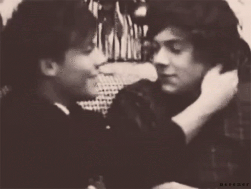 A Black And White Photo Of Two Men With The Word Nectar On The Bottom Right Corner GIF