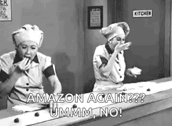 A Black And White Photo Of Two Women In Chef 'S Hats Standing Next To Each Other In A Kitchen . GIF