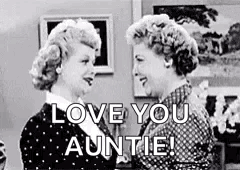 A Black And White Photo Of Two Women Standing Next To Each Other And Talking . GIF