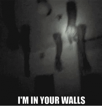 A Black And White Photo With The Words I 'M In Your Walls At The Bottom GIF