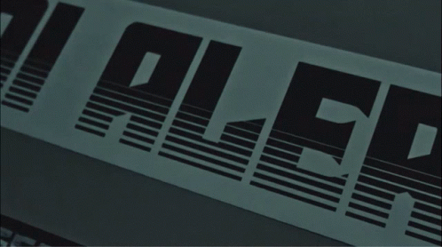 A Black And White Sign That Says " Ale " GIF