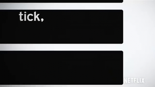 A Black And White Sign That Says Tick Tick Boom On It GIF