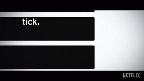 A Black And White Sign That Says Tick Tick Boom On It GIF