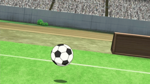 A Black And White Soccer Ball Is Flying Through The Air GIF