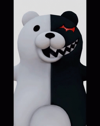 A Black And White Teddy Bear With Sharp Teeth GIF