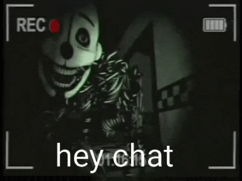 A Black And White Video Of A Stuffed Animal With The Words Hey Chat On The Bottom GIF