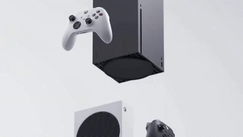 A Black And White Xbox Series S Console With Two Controllers Sitting On Top Of It . GIF