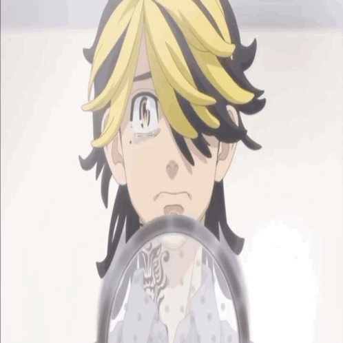 A Black And Yellow Anime Character With A Tattoo On His Chest Looks At Himself In A Mirror GIF