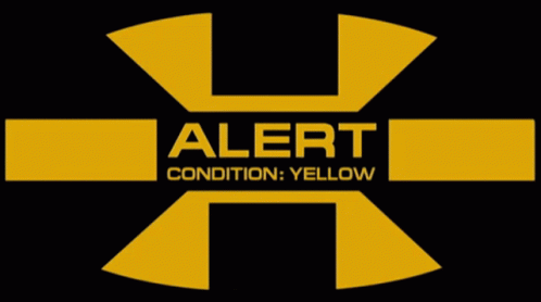 A Black And Yellow Sign That Says Alert Condition Yellow GIF