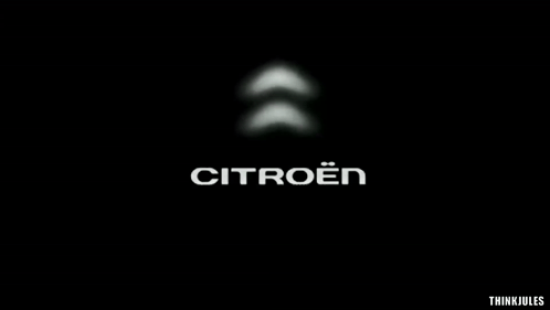 A Black Background With A Citroen Logo GIF