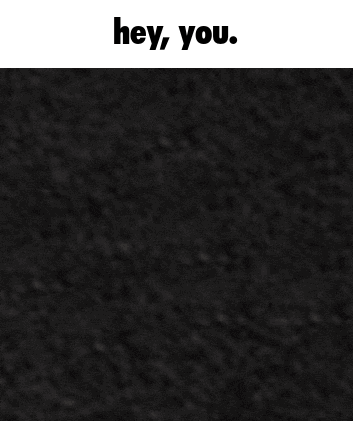 a black background with a drawing of a face and the words hey you below it