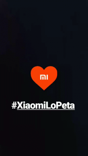 A Black Background With An Orange Heart With The Mi Logo On It GIF