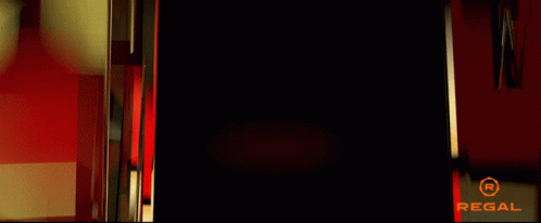 A Black Background With Red Lines And The Word Regal On The Bottom GIF