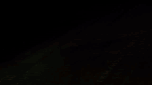 A Black Background With Yellow And White Lines And A Few Letters Written On It GIF