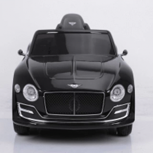 A Black Bentley Toy Car Is Sitting On A White Table GIF