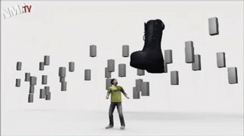 A Black Boot Is Surrounded By Blocks And The Words Nmjtv Are On The Bottom Right GIF