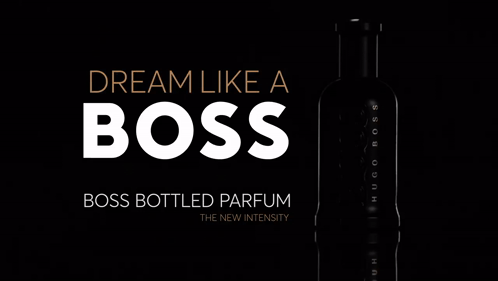 A Black Bottle Of Boss Bottled Parfum With The Words Inspire Like A Boss Above It GIF