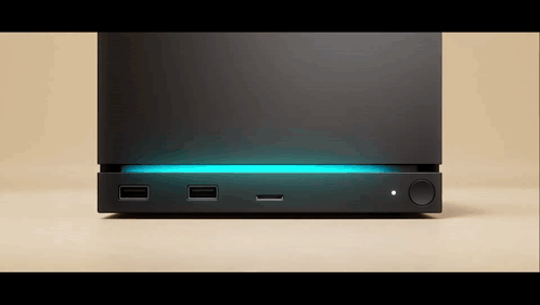 A Black Box With A Blue Light On The Bottom Of It GIF