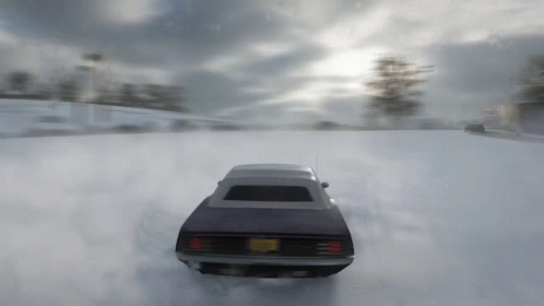 A Black Car With A New York License Plate Is Driving Through The Snow GIF