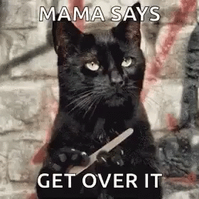 A Black Cat Is Holding A Knife In Its Paws And Says Mama Says Get Over It . GIF