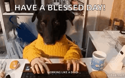 A Black Dog Is Sitting At A Desk Typing On A Keyboard . GIF