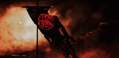 A Black Flag With A Red Dragon On It Is Flying In The Wind GIF