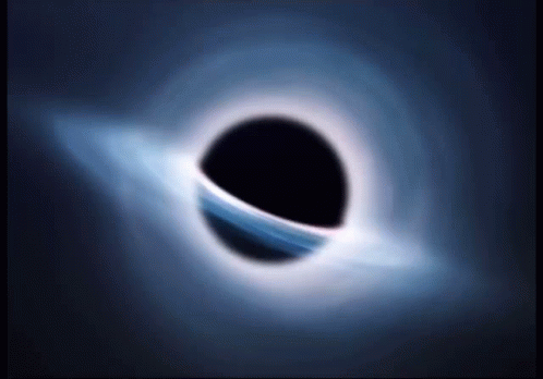 A Black Hole With A Blue Ring Around It In The Dark GIF