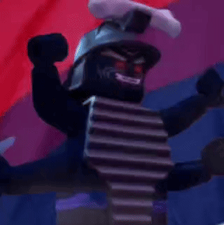A Black Lego Figure With Red Eyes And A Sword On Top Of His Head GIF